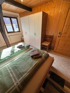 Postel nebo postele na pokoji v ubytování Haus-Ennstal