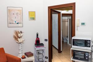Kuchyňa alebo kuchynka v ubytovaní Residenza Coccinelle vista Lago d'Iseo