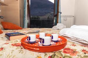 Posteľ alebo postele v izbe v ubytovaní Residenza Coccinelle vista Lago d'Iseo