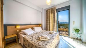 Posteľ alebo postele v izbe v ubytovaní Anemon Villas + 37 fotografií