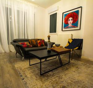 Ein Sitzbereich in der Unterkunft Skyview Luxury appartement à Montevrain