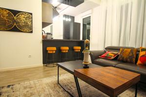 Ein Sitzbereich in der Unterkunft Skyview Luxury appartement à Montevrain