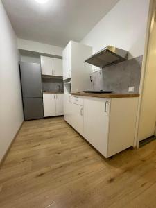 Kuchyň nebo kuchyňský kout v ubytování A Room In A Shared Flat Located At City Centre