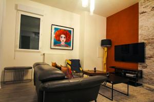TV/Unterhaltungsangebot in der Unterkunft Skyview Luxury appartement à Montevrain