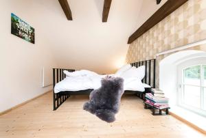 Cama o camas de una habitación en Pommernhaus Vorsee am Kiefernwald