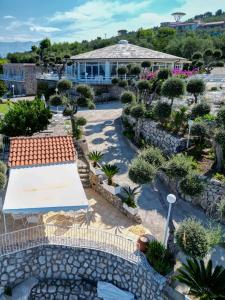 an aerial view of a garden with a house at Hotel Villa Lubrense Sorrento in Massa Lubrense