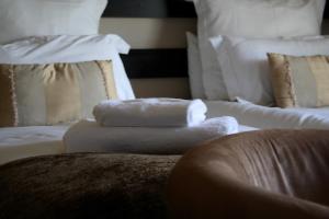 Letto o letti in una camera di Lemon & Lime Guesthouse
