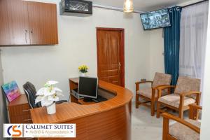 TV a/nebo společenská místnost v ubytování Calumet Suites airbnb and accommodation