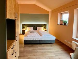 Kloster-Quartier tesisinde bir odada yatak veya yataklar