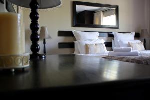 Letto o letti in una camera di Lemon & Lime Guesthouse