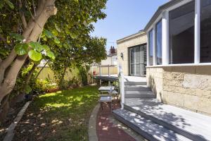 Сад в Dory's Beach House - Executive Escapes