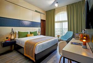 Cama ou camas em um quarto em TIME Express Hotel Al Khan