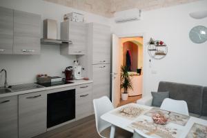Una cocina o zona de cocina en La Dimora di Venere