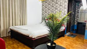 Postel nebo postele na pokoji v ubytování Star Residence