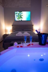 TV a/nebo společenská místnost v ubytování La Dimora di Venere