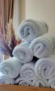 a pile of towels stacked on top of each other at Struga Riverview Hotel in Struga