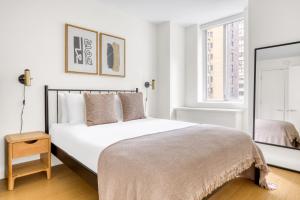 Imagen de la galería de Midtown E 2br w elevator doorman gym nr UN NYC-752, en Nueva York 33 fotos más