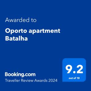a screenshot of a phone with the text upgraded to ontario apartment batahina at Oporto apartment Batalha in Porto