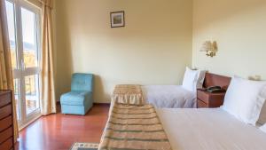 Cama ou camas em um quarto em Hotel Belsol