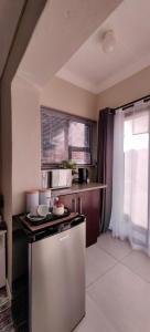 Dapur atau dapur kecil di Emerald Boutique Guesthouse