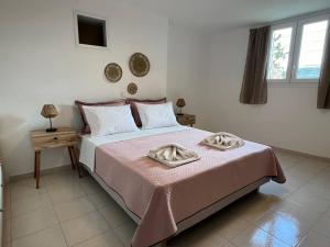 Postel nebo postele na pokoji v ubytování Krios Guesthouse