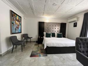 Letto o letti in una camera di UrbaN RootZ