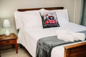 Ένα ή περισσότερα κρεβάτια σε δωμάτιο στο Die Karee Tuiste