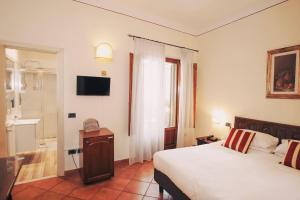 TV a/nebo společenská místnost v ubytování Hotel Galileo