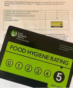 The Waterford Arms في Hartley: a food cleanliness rating box with a food cleanliness rating receipt