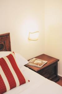 Postel nebo postele na pokoji v ubytování Hotel Galileo