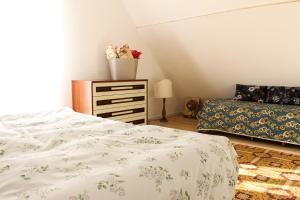 Letto o letti in una camera di Villa Anna