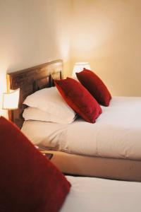 Postel nebo postele na pokoji v ubytování Hotel Galileo