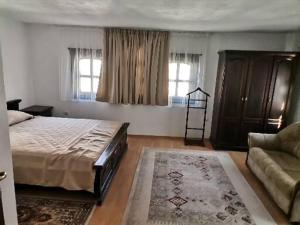 Postel nebo postele na pokoji v ubytování Hotel Bolyarka