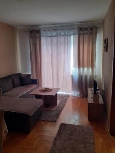 Prostor za sedenje u objektu Apartman MS
