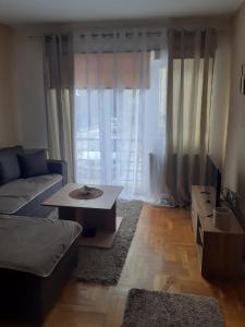 Prostor za sedenje u objektu Apartman MS