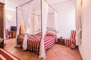 Postel nebo postele na pokoji v ubytování Hotel Galileo + 37 fotografií