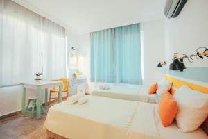 Ένα ή περισσότερα κρεβάτια σε δωμάτιο στο Kuytu Bed & Breakfast