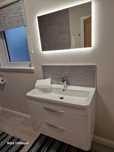 Koupelna v ubytování Ben Arthur Apartment + 28 fotografií