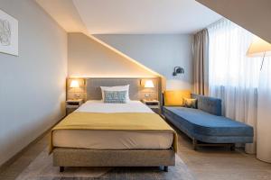 Postel nebo postele na pokoji v ubytování Hotel Europa