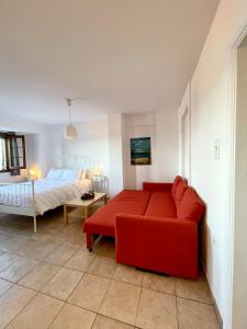A bed or beds in a room at Aegean View House