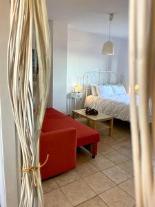 A bed or beds in a room at Aegean View House