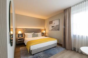 Postel nebo postele na pokoji v ubytování Hotel Europa