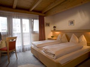 Postelja oz. postelje v sobi nastanitve Hotel Christian