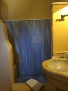 A bathroom at Tinian View Maisonette