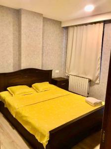 Ένα ή περισσότερα κρεβάτια σε δωμάτιο στο daily rental