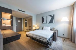 Postel nebo postele na pokoji v ubytování Hotel Europa