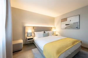 Postel nebo postele na pokoji v ubytování Hotel Europa