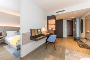 Postel nebo postele na pokoji v ubytování Hotel Europa