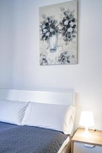 Postel nebo postele na pokoji v ubytování Jardín Botánico Rooms