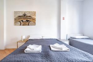 Postel nebo postele na pokoji v ubytování Jardín Botánico Rooms